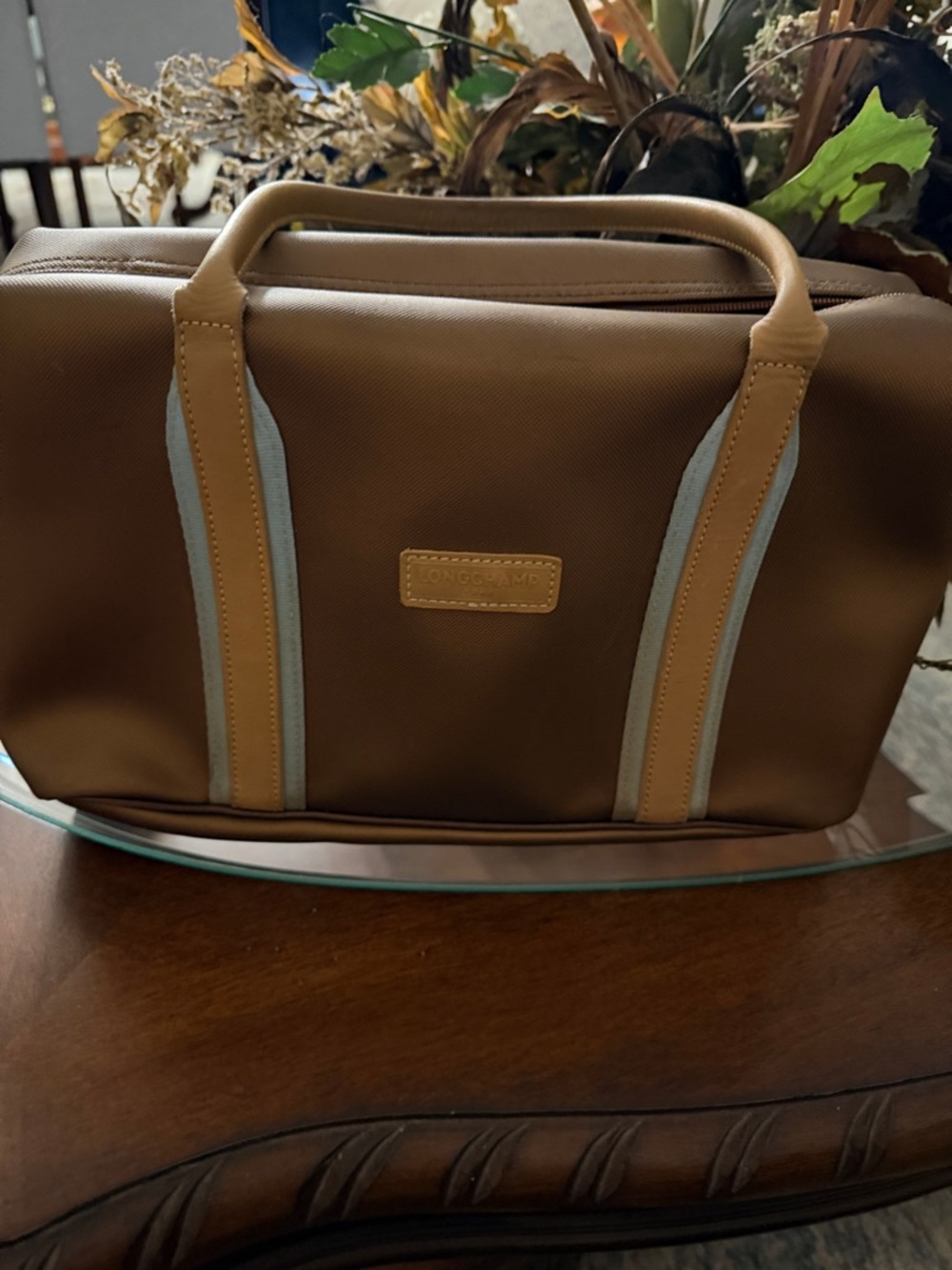 Longchamp Brown Toiletry Bag with Tan Handles and Light Gray Stripes